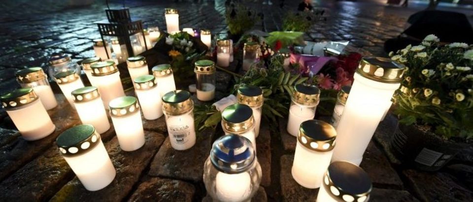 Candles at Turku Market Square for the victims of Friday's stabbings are pictured in Turku