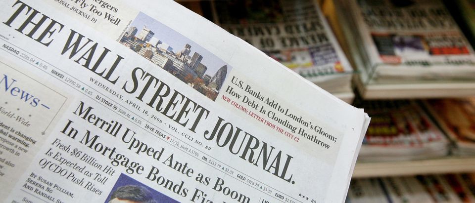 The U.S. Edition of The Wall Street Journal is displayed in front of British newspapers which it now sells alongside on a news stand in London on April 16, 2008 in London, England. Today is the first day the U.S. Edition of the newspaper goes on sale in U.K. (Photo by Cate Gillon/Getty Images)