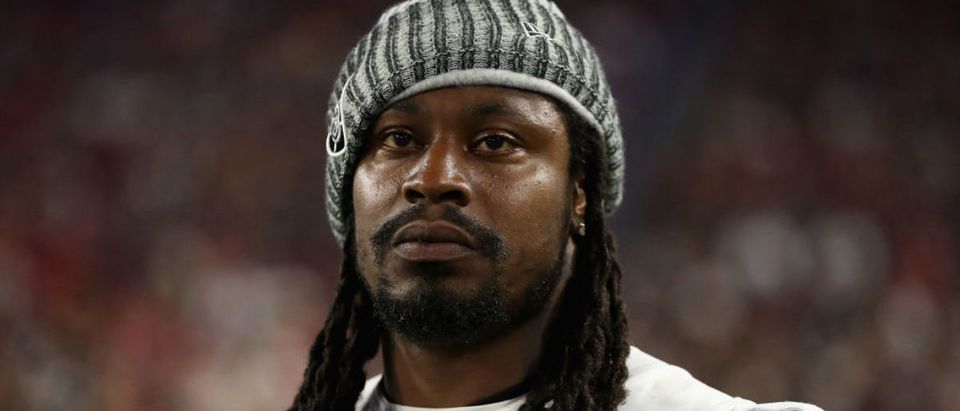 Running back Marshawn Lynch #24 of the Oakland Raiders stands on the sidelines during the NFL game against the Arizona Cardinals at the University of Phoenix Stadium on August 12, 2017 in Glendale, Arizona. (Photo by Christian Petersen/Getty Images)