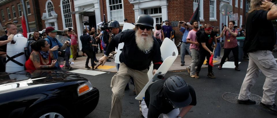 Members of white nationalists clash a group of counter-protesters in Charlottesville Virginia