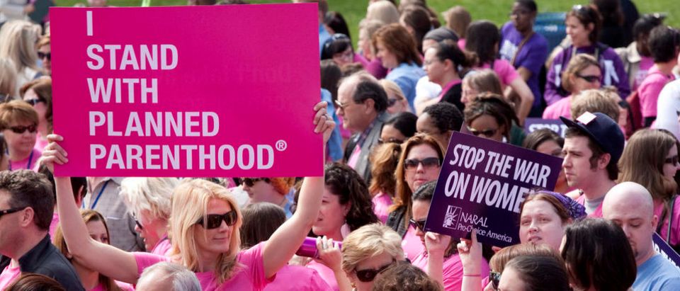 Members of Planned Parenthood, NARAL Pro-Choice America and more than 20 other organizations hold a "Stand Up for Women's Health" rally in support of preventive health care and family planning services, including abortion, in Washington April 7, 2011. (Photo: REUTERS/Joshua Roberts)