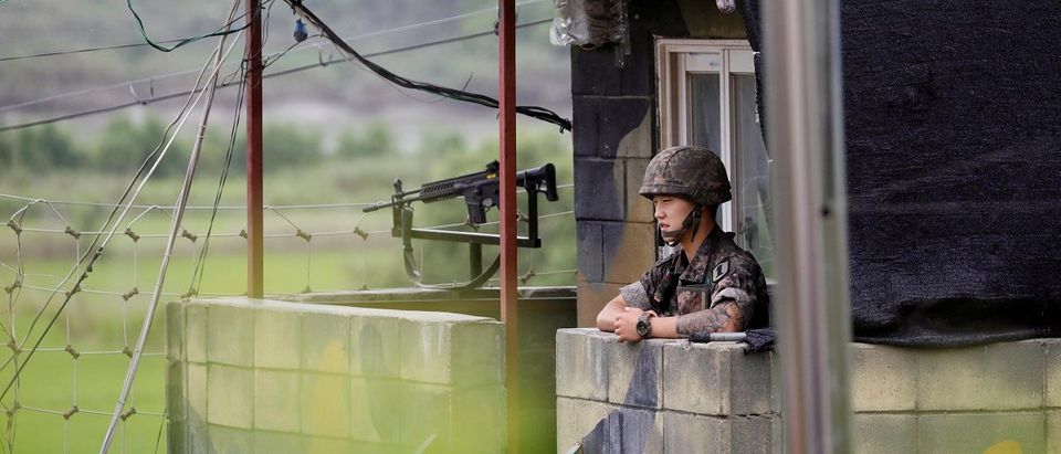 A South Korean soldiers stands guard at a guard post near the demilitarised zone separating the two Koreas in Paju