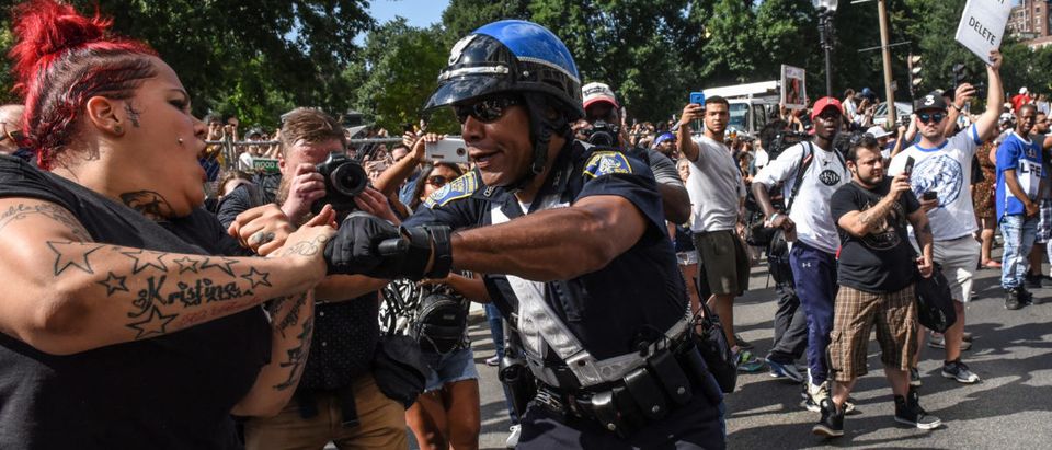 Counter protesters clash with Boston Police outside of the Boston Commons and the Boston Free Speech Rally in Boston, Massachusetts, U.S., August 19, 2017. REUTERS/Stephanie Keith