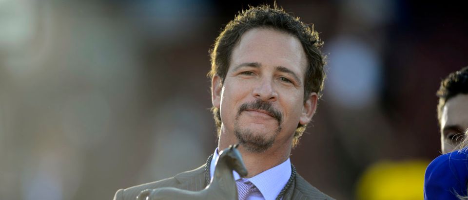 Nov 2, 2013; Arcadia, CA, USA; Jim Rome, owner of Mizdirection attends victory circle ceremonies of race seven of of the 2013 Breeders' Cup Championships at Santa Anita Park. Mandatory Credit: Kelvin Kuo-USA TODAY Sports via Reuters - RTX14XVL