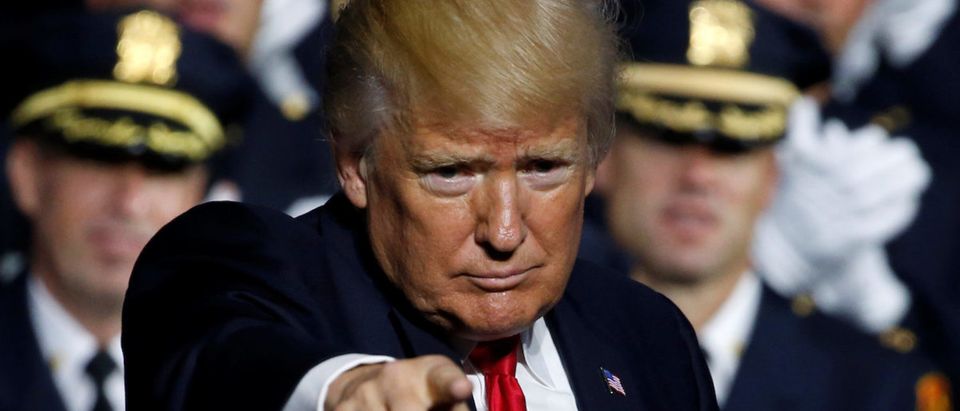 Trump concludes his remarks about his proposed U.S. government effort against the street gang Mara Salvatrucha, or MS-13, to a gathering of federal, state and local law enforcement officials in Brentwood, New York (Photo: REUTERS/Jonathan Ernst - RTX3DC56)