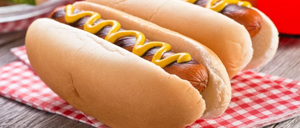 Hot dogs with mustard. [Shutterstock - Foodio]