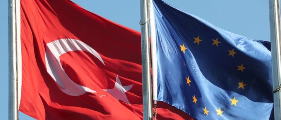 European Union and Turkish flags fly at the business and financial district of Levent in Istanbul