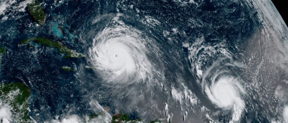 Hurricane Irma (L) and Hurricane Jose are pictured in the Atlantic Ocean in this NOAA satellite handout photo