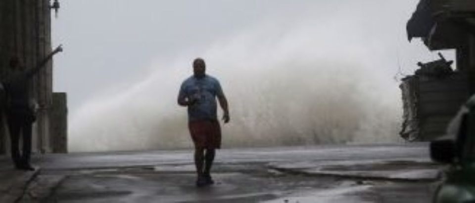 Waves crash on the street as Hurricane Irma turns toward the Florida Keys on Saturday, in Havana