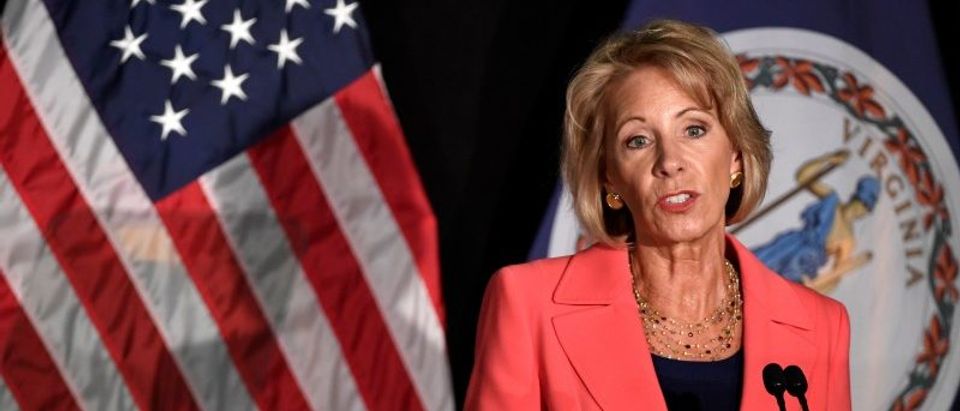 FILE PHOTO: Education Secretary Betsy DeVos makes remarks during a major policy address on Title IX enforcement, which in college covers sexual harassment, rape and assault, at George Mason University, in Arlington, Virginia, U.S., September 7, 2017. REUTERS/Mike Theiler