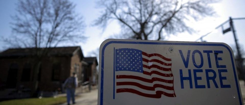 FILE PHOTO: A voter arrives to cast their ballot in the Wisconsin presidential primary election at a voting station in Milwaukee Wisconsin
