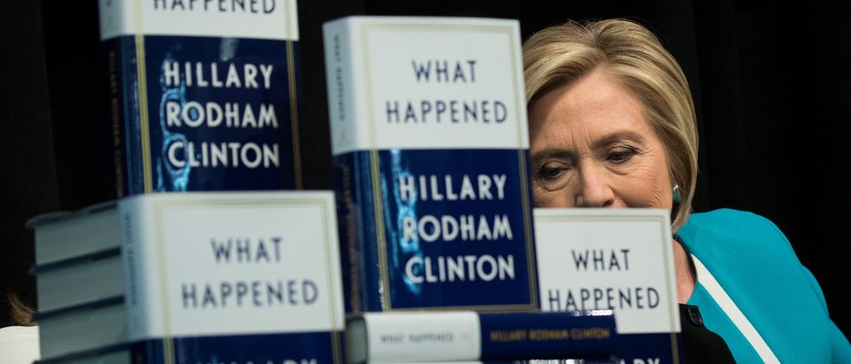 NEW YORK, NY - SEPTEMBER 12: Former U.S. Secretary of State Hillary Clinton signs copies of her new book "What Happened" during a book signing event at Barnes and Noble bookstore September 12, 2017 in New York City. Clinton's book, which focuses on her 2016 election loss to President Donald Trump, goes on sale today. (Photo by Drew Angerer/Getty Images)