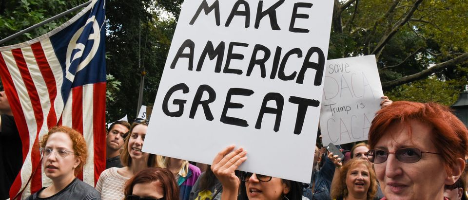 People participate in a protest in defense of the Deferred Action for Childhood Arrivals program or DACA in New York