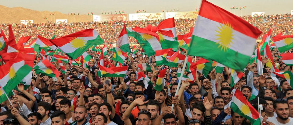 Kurdish people attend a rally to show their support for the upcoming September 25th independence referendum in Duhuk