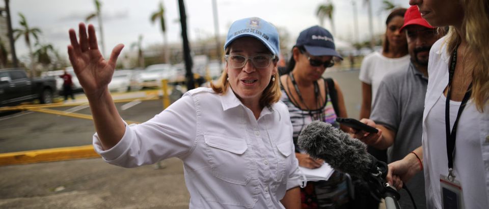 Mayor of San Juan Carmen Yulin Cruz talks with journalists outside the government center at the Roberto Clemente Coliseum days after Hurricane Maria, in San Juan, Puerto Rico September 30, 2017 REUTERS/Carlos Barria