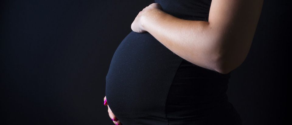 Shutterstock/ Pregnant woman stands with her hands at the belly pregnantblackwomandepressionanticipationawaitingbackbackgroundbedroombellycalmcomfortablecreativecurvesemotionalexpectantexpectingfemalefigurehandhealthhealthyhorizontalhumanindoorslifestylelitlyingmaternitymothermotherhoodnightparenthoodpersonportraitpregnancypressurerelaxationrestingsensualitysidesiluetteskinstomachstudiotiredtouchingtummyviewworriedyoung Show more