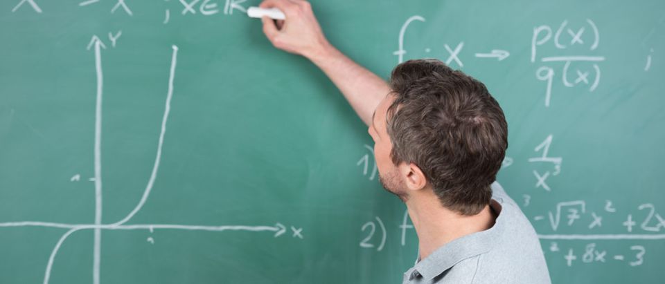 Shutterstock/ Rear view mature male teacher holding paper while writing on chalkboard in classroom teachermalewritingboardclassroommanbehindformulachalkboardhandcollegepaperblackboardbackcertificatechalkclassdegreediagrameducateeducationequationexplanationgraphhandsomeholdinginformationintelligentknowledgelearninglecturelecturermathematicalmathsnotespresentationprimaryprofessorresearchschoolschoolingscientificsecondarystudyteachingtertiaryuniversitywisdomyoungShow more