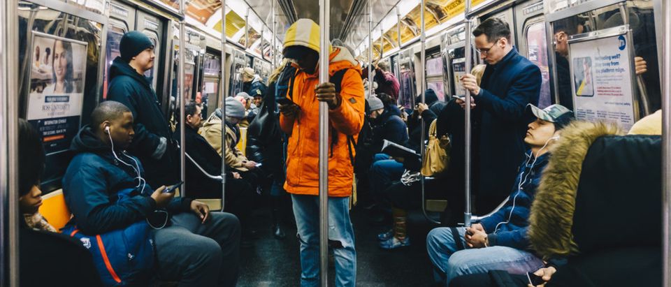 Shutterstock/ New York, Usa - March 18 2017: Passengers riding in the NYC Subway in the rush hour. Shutterstock/ Clari Massimiliano