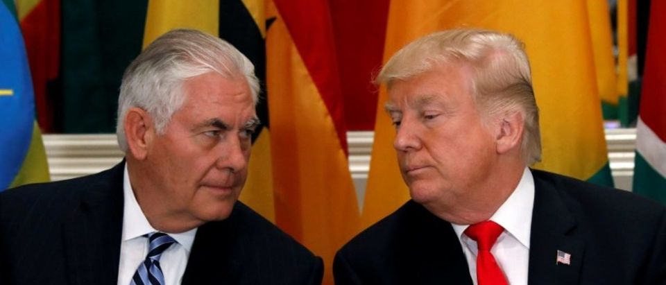 FILE PHOTO: U.S. President Donald Trump and Secretary of State Rex Tillerson confer during a working lunch in New York