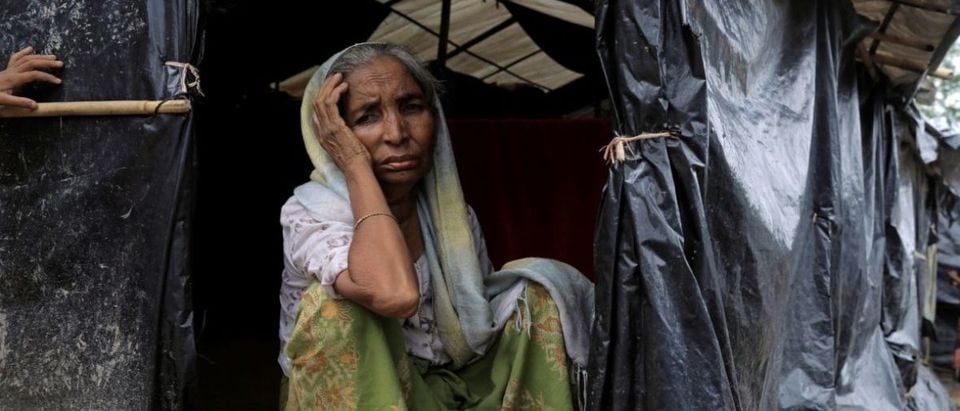A Rohingya refugee woman sits in her tent in the Kutupalong Refugee Camp in Cox's Bazar, Bangladesh October 12, 2017. REUTERS/Zohra Bensemra