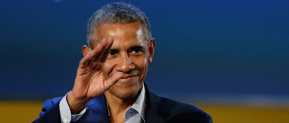 Former U.S. President Barack Obama waves after speaking at the Global Food Innovation Summit in Milan
