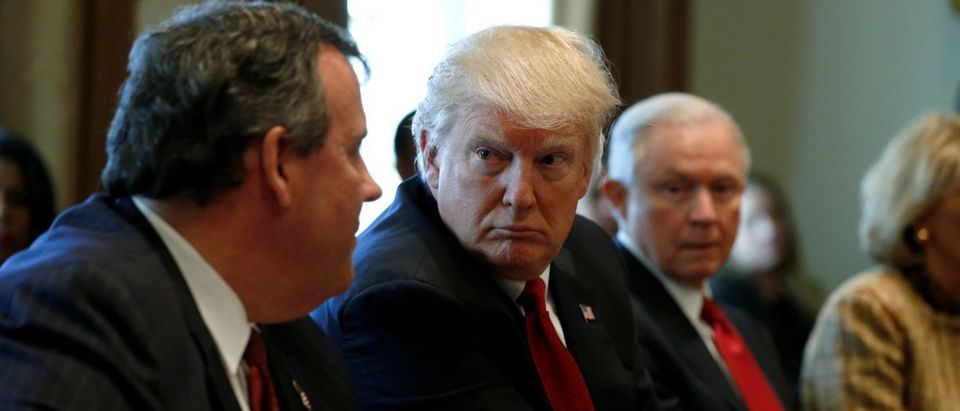 U.S. President Donald Trump (2nd L), flanked by New Jersey Governor Chris Christie (L) and Attorney General Jeff Sessions (R), holds an opioid and drug abuse listening session at the White House in Washington, U.S. March 29, 2017. REUTERS/Jonathan Ernst