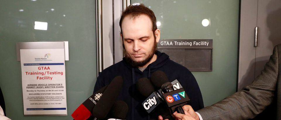 Joshua Boyle speaks to the media after arriving with his wife and three children to Toronto Pearson International Airport, nearly 5 years after he and his wife were abducted in Afghanistan in 2012 by the Taliban-allied Haqqani network, in Toronto, Ontario, Canada, October 13, 2017. (REUTERS/Mark Blinch)