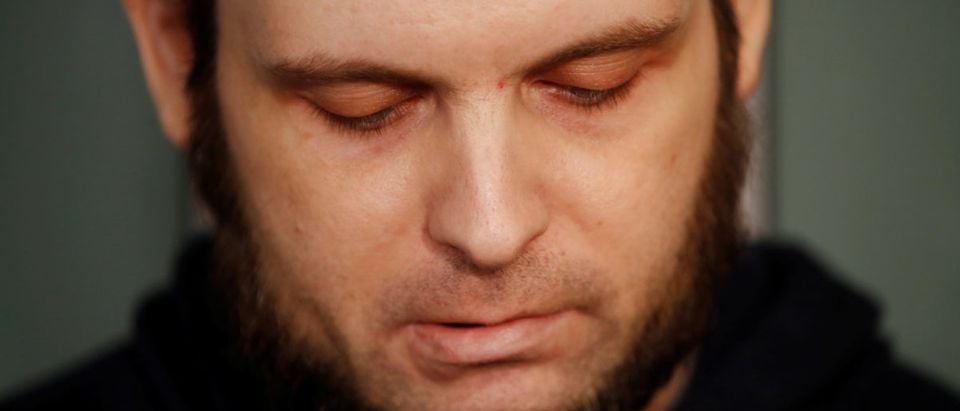 Joshua Boyle speaks to the media after arriving with his wife and three children at Toronto Pearson International Airport, nearly 5 years after he and his wife were abducted in Afghanistan in 2012 by the Taliban-allied Haqqani network, in Toronto, Ontario, Canada, October 13, 2017. (REUTERS/Mark Blinch)