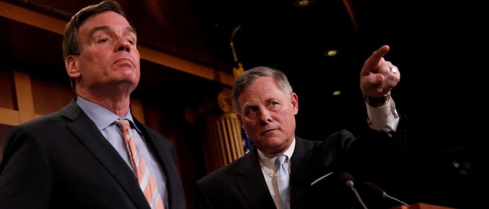 Senate Intelligence Committee Chairman Sen. Richard Burr (R-NC), accompanied by Senator Mark Warner (D-VA), vice chairman of the committee, speaks at a news conference to discuss their probe of Russian interference in the 2016 election on Capitol Hill in Washington, D.C., March 29, 2017. REUTERS/Aaron P. Bernstein