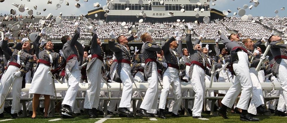 Class of 2012 cadets from the United States Military Academy at West Point toss their hats. US Army Flickr
