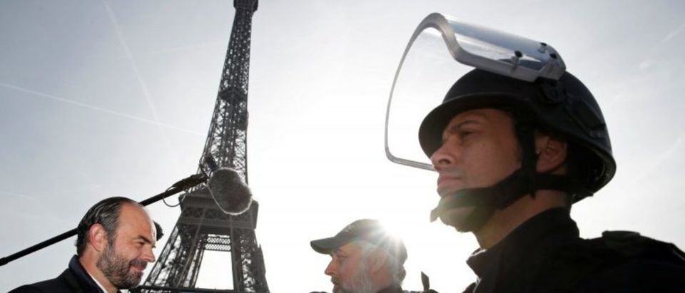 French PM Philippe meets police forces during a visit at the Eiffel Tower in Paris