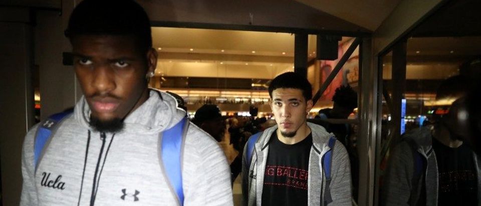 UCLA basketball players LiAngelo Ball and Cody Riley arrive at LAX after flying back from China where they were detained on suspicion of shoplifting, in Los Angeles