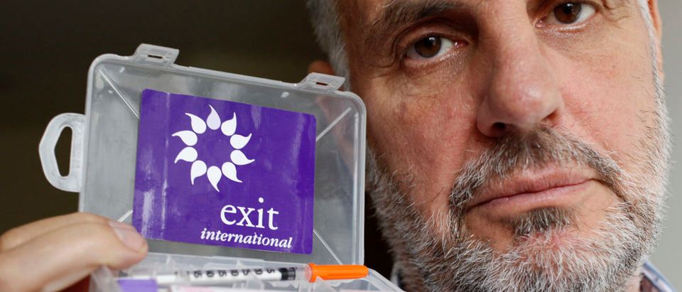 Euthanasia campaigner Dr. Philip Nitschke poses for the photographer with his 'suicide kit' after a Reuters Interview in London May 7, 2009. The British government is ducking the increasingly urgent issue of right-to-die legislation by turning a blind eye to Britons using Swiss suicide clinics to kill themselves, according to Nitschke, who says it is time for Britain and others to heed growing calls for choice about dying, and allow access to effective suicide drugs. Euthanasia campaigner Dr. Philip Nitschke poses for the photographer with his 'suicide kit' after a Reuters Interview in London May 7, 2009. The British government is ducking the increasingly urgent issue of right-to-die legislation by turning a blind eye to Britons using Swiss suicide clinics to kill themselves, according to Nitschke, who says it is time for Britain and others to heed growing calls for choice about dying, and allow access to effective suicide drugs. REUTERS/Stefan Wermuth