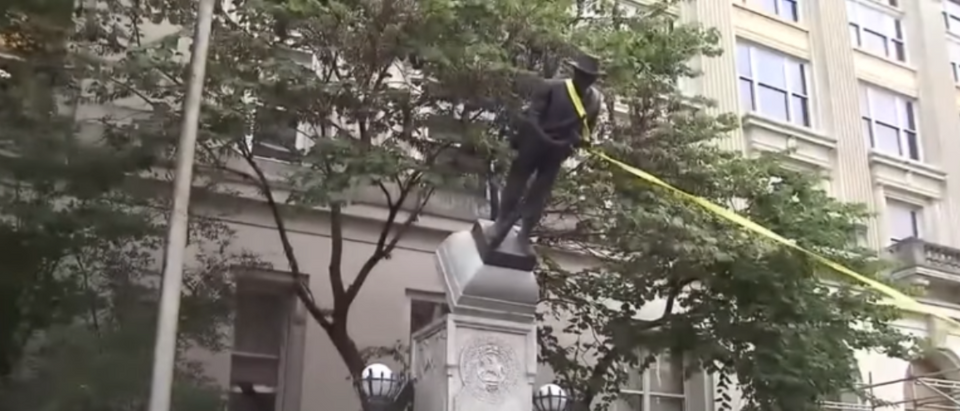 Protesters tear down a statue of a Confederate soldier in Durham, North Carolina. (Photo Credit: YouTube/NBC4 WCMH-TV Columbus)
