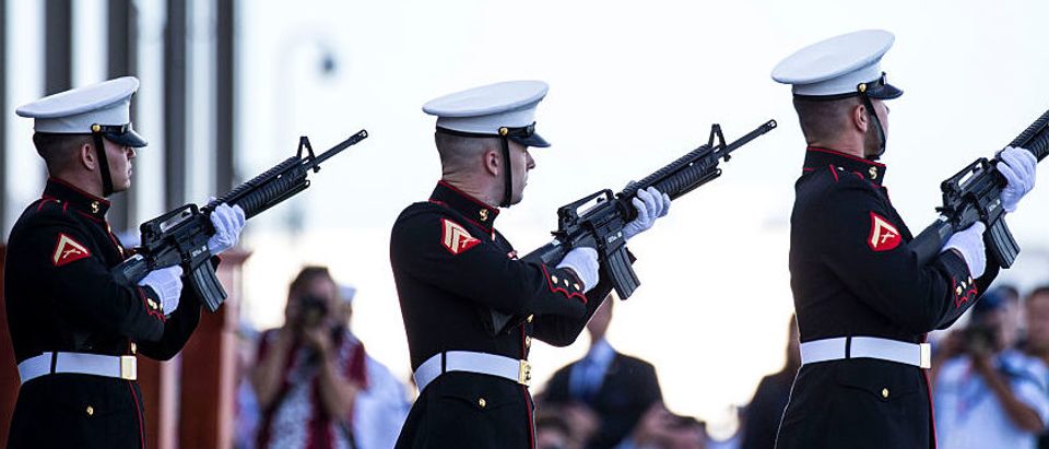 A U.S. Marine Corps unit fires a rifle salute during a ceremony commemorating the 75th anniversary of the attack on Pearl Harbor at Kilo Pier on December 07, 2016 in Honolulu, Hawaii. (Photo by Kent Nishimura/Getty Images)