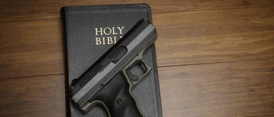 Gun and Bible (shutterstock/ heller)