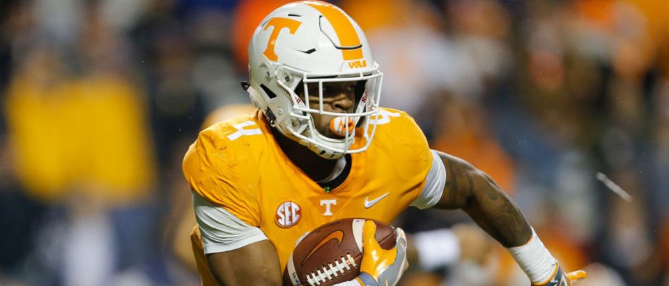 John Kelly #4 of the Tennessee Volunteers runs with the ball against the LSU Tigers during the first half at Neyland Stadium on November 18, 2017 in Knoxville, Tennessee. (Photo by Michael Reaves/Getty Images)
