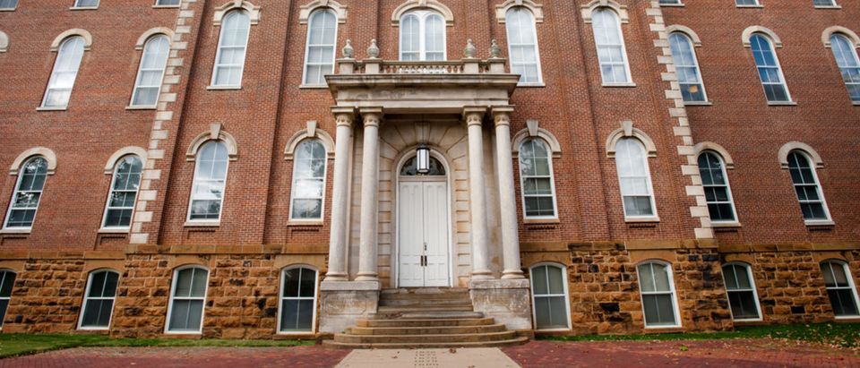 The Old Main with Senior Walk is the oldest building on the University of Arkansas campus. (Shutterstock/Natalia Bratslavsky)