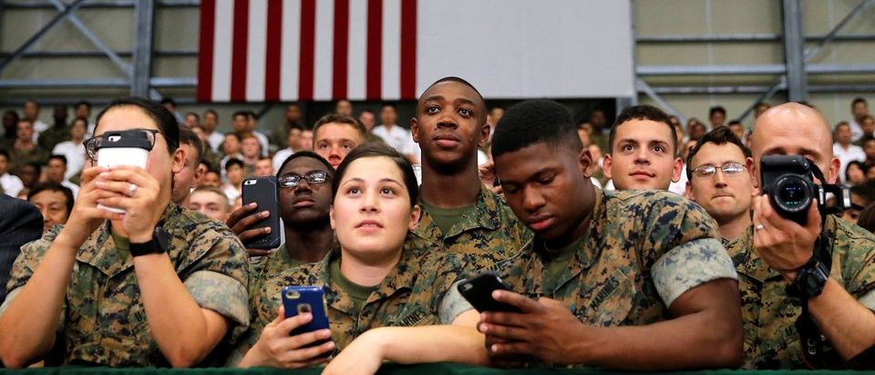 U.S. and Japan Self-Defence Force's soldiers listen a speech by U.S. President Barack Obama during his visits at Iwakuni Marine Corps Air Station, enroute to Hiroshima, Japan