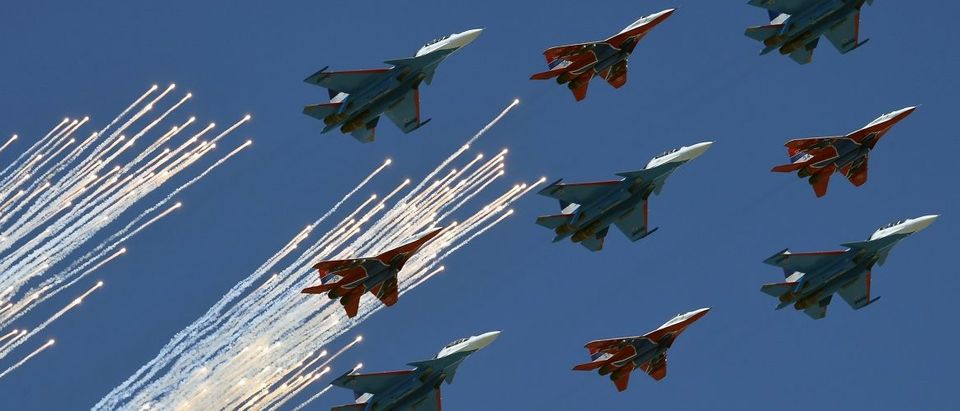 A mixed flight group of Strizhi (Swifts) on MIG-29 aircrafts and Russkie Vityazi (Russian knights) on Su-30 aircrafts fly over Red Square during the Victory Day military parade general rehearsal in Moscow on May 7, 2017. (Photo: Kirill Kudryavtsev/AFP/Getty Images)