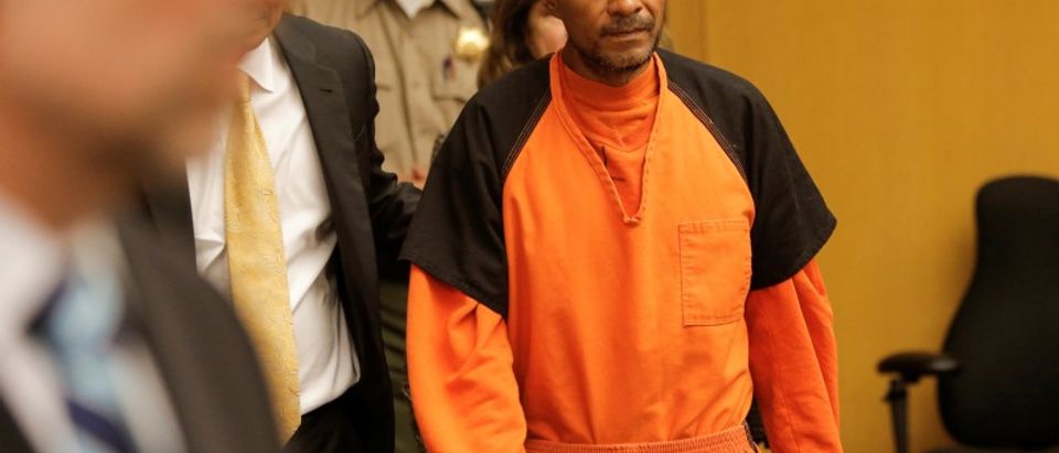 FILE PHOTO: Jose Ines Garcia Zarate is led into the Hall of Justice for his arraignment in San Francisco