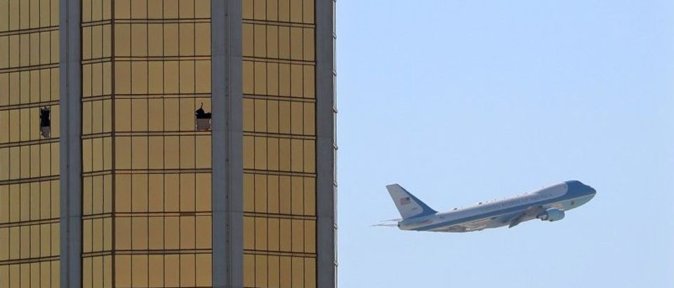 Air Force One departs Las Vegas past the broken windows on the Mandalay Bay hotel, where shooter Stephen Paddock conducted his mass shooting along the Las Vegas Strip in Las Vegas, Nevada, U.S., October 4, 2017. REUTERS/Mike Blake/File photo