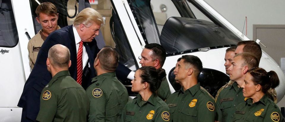 U.S. President Donald Trump greets Border Patrol agents as he tours the U.S. Customs and Border Patrol facility in Yuma, Arizona