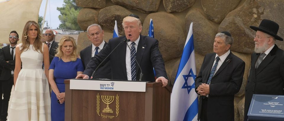 In this handout photo provided by the Israel Government Press Office (GPO),US President Donald Trump visit to Yad Vashem Holocaust museum in Jerusalem, Israel, accompanied by Prime Minister Benjamin Netanyahu on May 23, 2017 in Jerusalem, Israel. Trump arrived for a 28-hour visit to Israel and the Palestinian Authority areas on his first foreign trip since taking office in January. (Photo by Amos Ben Gershom/GPO via Getty Images)