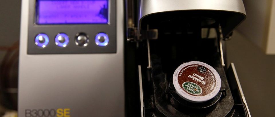 FILE PHOTO: A single-serve Keurig Green Mountain brewing machine is seen before dispensing coffee in New York