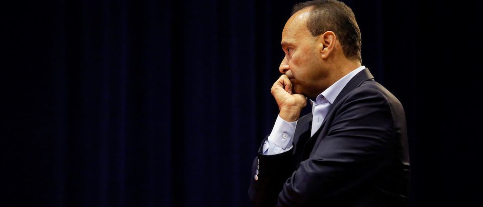 Congressman Luis Gutierrez (D-IL 4th Dist) listens to A Deferred Action for Childhood Arrivals (DACA) recipient speak during a town hall style meeting about protecting DACA recipients in Chicago, Illinois