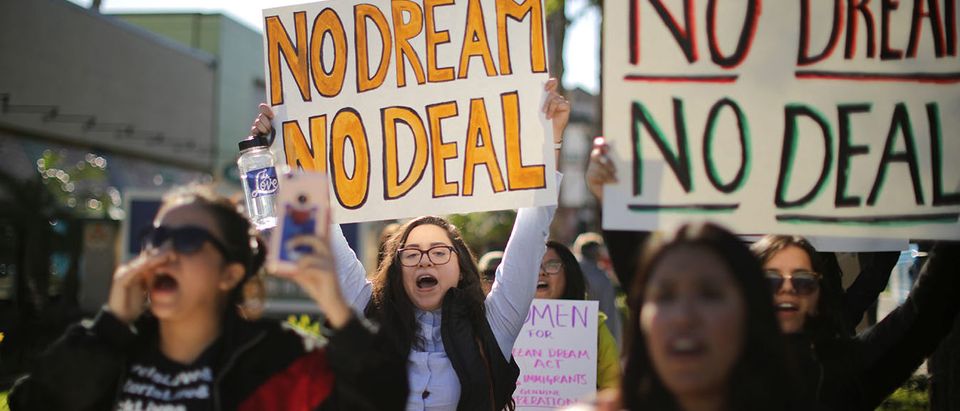 DACA recipients and supporters protest for a clean Dream Act outside Disneyland in Anaheim