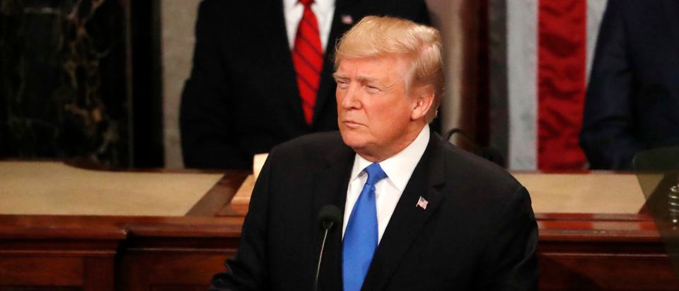 U.S. President Trump pauses while delivering his State of the Union address in Washington