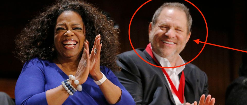 Entertainer Oprah Winfrey and producer Harvey Weinstein laugh before receiving W.E.B. Du Bois Medals at the Hutchins Center Honors at Harvard University in Cambridge