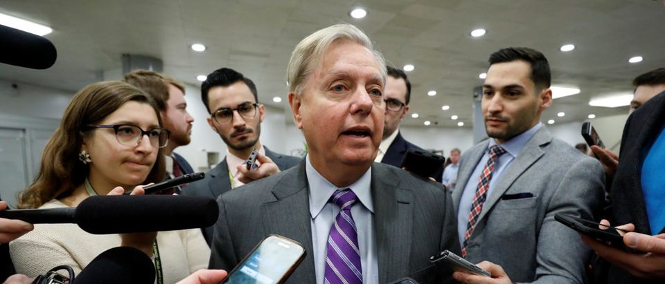 Sen. Lindsey Graham speaks with reporters ahead of votes on Capitol Hill in Washington